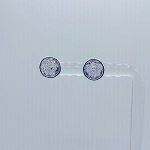 Silver circular shaped stud earrings